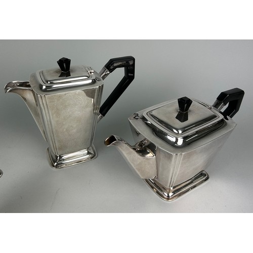 132 - AN ART DECO SILVER TEA SET BY WILLIAM ADAMS COMPRISING A TEA POT, COFFEE POT, MILK JUG AND SUGAR BOW... 