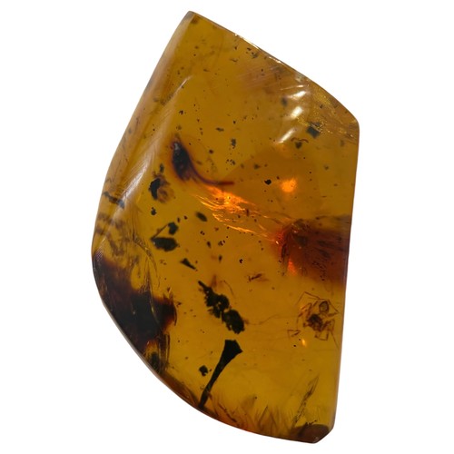 276 - A SPIDER FOSSIL IN AMBER

A large amber gem containing a very detailed spider. From the amber mines ... 