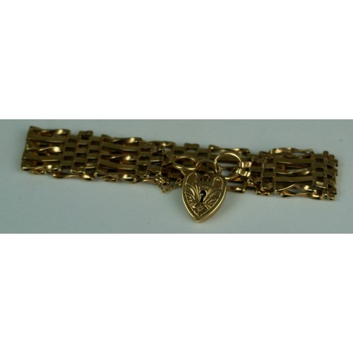 169 - A 9CT GOLD LOCKET ON CHAIN LINK BRACELET, 

Weight: 19gms