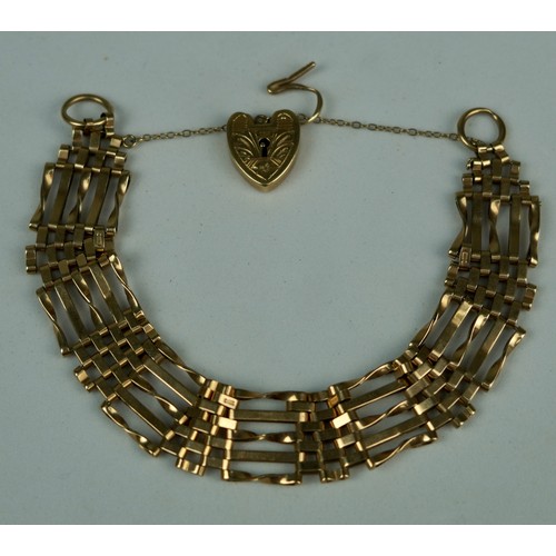 169 - A 9CT GOLD LOCKET ON CHAIN LINK BRACELET, 

Weight: 19gms