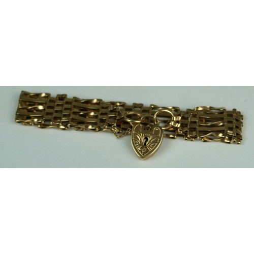 169 - A 9CT GOLD LOCKET ON CHAIN LINK BRACELET, 

Weight: 19gms