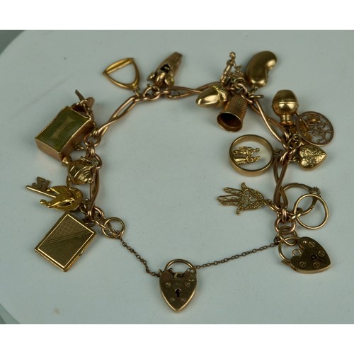 171 - A 9CT GOLD CHARM BRACELET, 

Total weight: 43gms