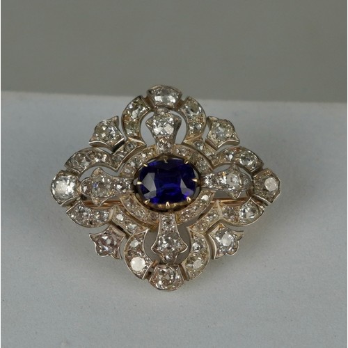 160 - A FINE 14CT GOLD BANGLE WITH CENTRAL CLAW SET SAPPHIRE SURROUNDED BY DIAMOND CLUSTERS,

Multi functi... 