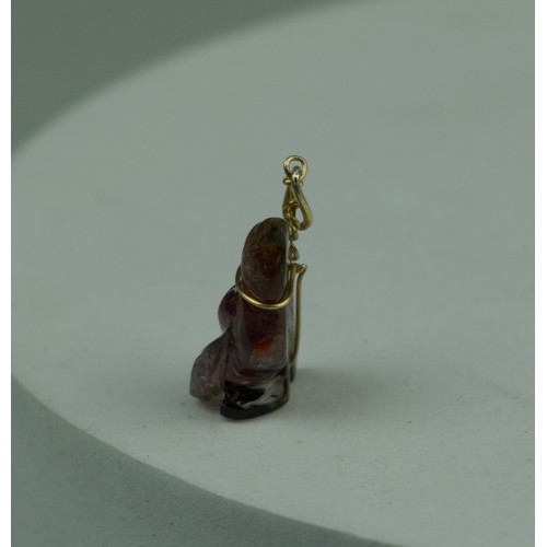 222 - A CARVED TOURMALINE BIRD PENDANT, 

Weight: 2.2gms 

20mm x 15mm