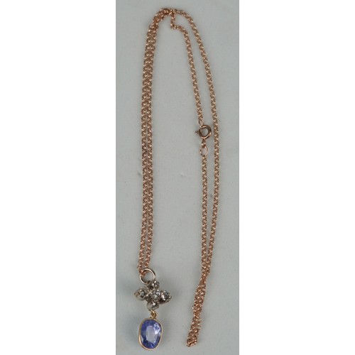 164 - A GEORGIAN SAPPHIRE WITH OLD DIAMONDS ON A 9CT GOLD CHAIN, 

Weight 5.1gms 
Chain length 240mm