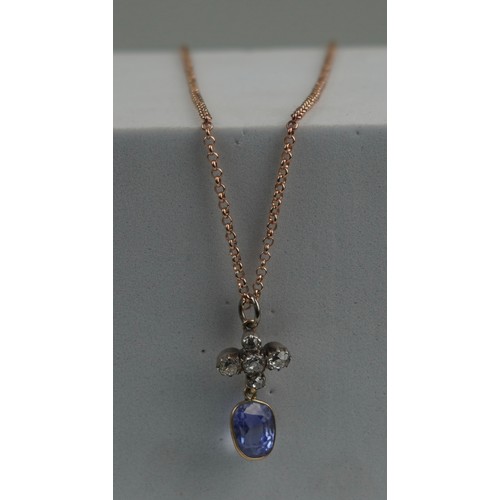 164 - A GEORGIAN SAPPHIRE WITH OLD DIAMONDS ON A 9CT GOLD CHAIN, 

Weight 5.1gms 
Chain length 240mm