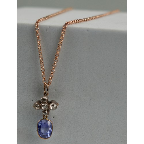 164 - A GEORGIAN SAPPHIRE WITH OLD DIAMONDS ON A 9CT GOLD CHAIN, 

Weight 5.1gms 
Chain length 240mm