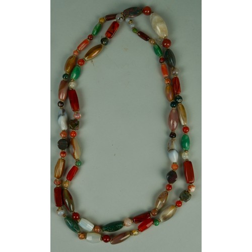 227 - A FINE SCOTTISH AGATE AND HARDSTONE NECKLACE COMPRISING EIGHT FIVE INDIVIDUAL STONES, 

Strung with ... 