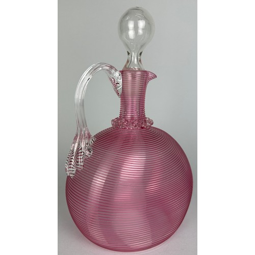 331 - A MID CENTURY MURANO PINK RIBBED DECANTER WITH STOPPER,

25cm H