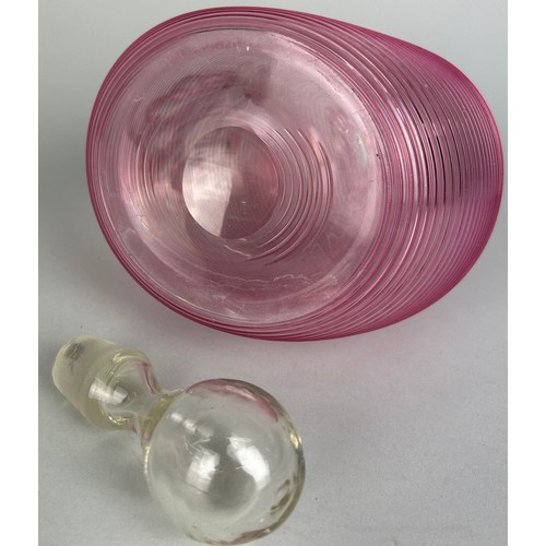 331 - A MID CENTURY MURANO PINK RIBBED DECANTER WITH STOPPER,

25cm H