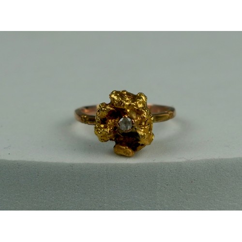 186 - A 14CT GOLD RING SET WITH A LARGE GOLD NUGGET AND CLEAR STONE, 

Stone tests as not diamond. 

Weigh... 