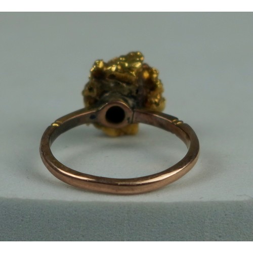 186 - A 14CT GOLD RING SET WITH A LARGE GOLD NUGGET AND CLEAR STONE, 

Stone tests as not diamond. 

Weigh... 