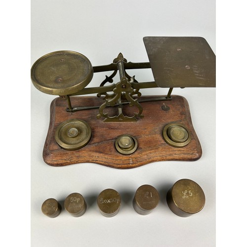 538 - A SET OF ANTIQUE SCALES AND OLD BANK WEIGHTS