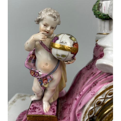 341 - AN UNUSUAL 18TH OR 19TH CENTURY MEISSEN MANTLE CLOCK WITH A PUTTI HOLDING A GLOBE, 

Two crossed swo... 