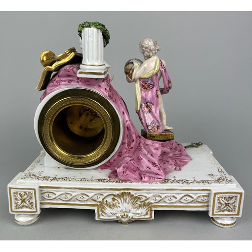 341 - AN UNUSUAL 18TH OR 19TH CENTURY MEISSEN MANTLE CLOCK WITH A PUTTI HOLDING A GLOBE, 

Two crossed swo... 