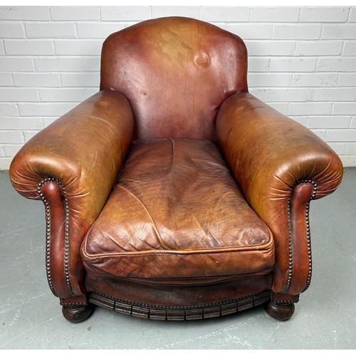 497 - A LARGE ART DECO TAN LEATHER CLUB CHAIR, 

85cm x 75cm x 75cm