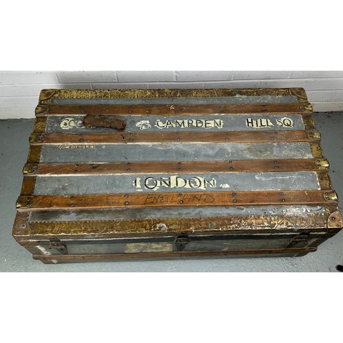 493 - A LARGE ZINC AND BRASS BOUND EXPLORERS TRUNK, 

92cm x 52cm x 33cm

Late 19th or early 20th Century,... 