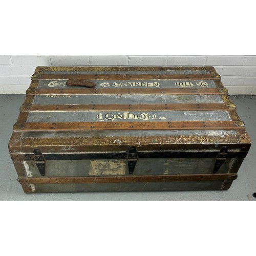 493 - A LARGE ZINC AND BRASS BOUND EXPLORERS TRUNK, 

92cm x 52cm x 33cm

Late 19th or early 20th Century,... 