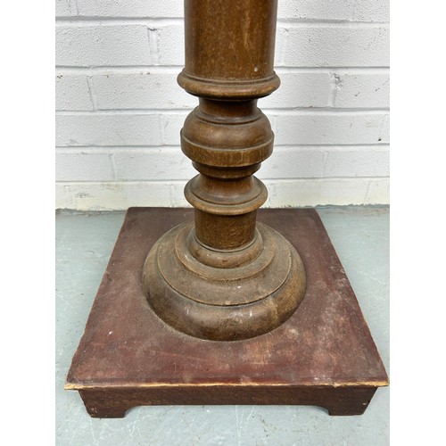 508 - A LARGE WOODEN TORCHERE,

110cm x 30cm