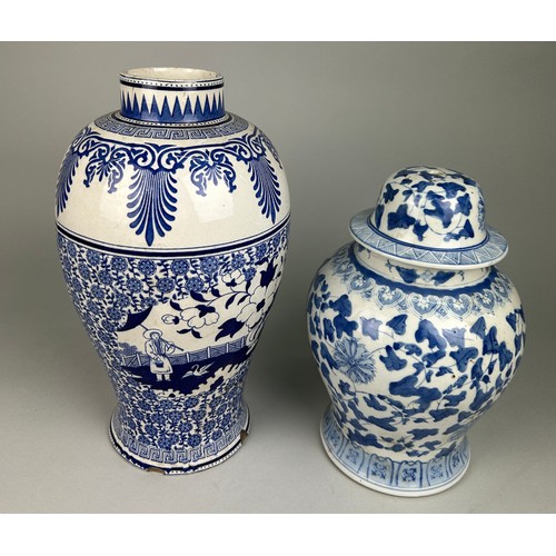 542 - TWO BLUE AND WHITE VASES,

One with damage. 

Largest 40cm H