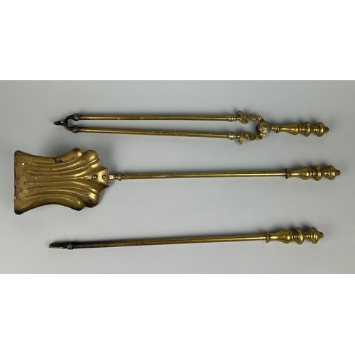 520 - THREE ANTIQUE BRASS FIRE TOOLS (3)