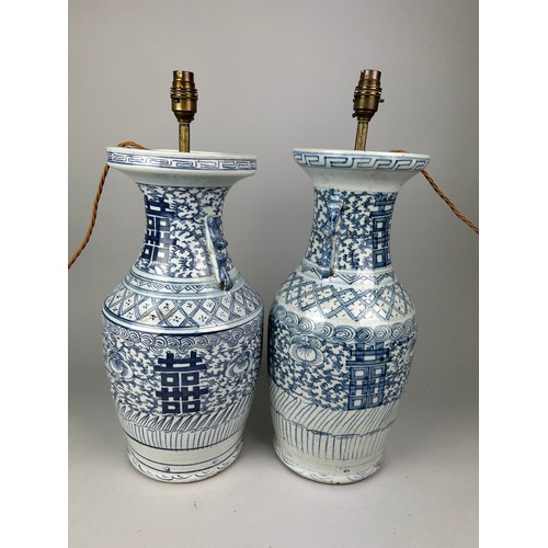 484 - A VERY NEAR PAIR OF LATE 19TH OR EARLY 20TH CENTURY CHINESE BLUE AND WHITE VASES ADAPTED AS TABLE LA... 