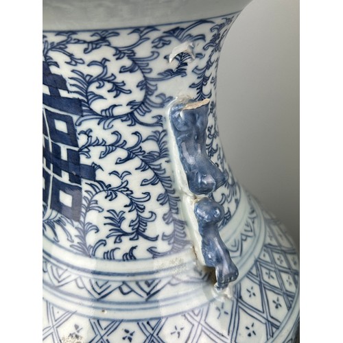 484 - A VERY NEAR PAIR OF LATE 19TH OR EARLY 20TH CENTURY CHINESE BLUE AND WHITE VASES ADAPTED AS TABLE LA... 