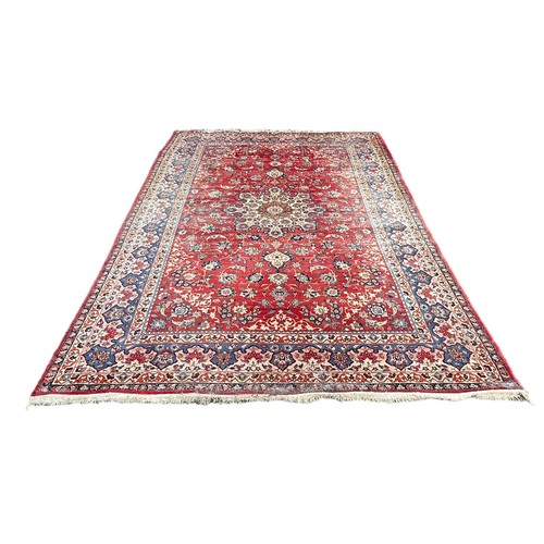 539 - A LARGE PERSIAN CARPET, 

395cm x 260cm 

Some wear.