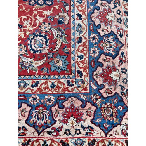 539 - A LARGE PERSIAN CARPET, 

395cm x 260cm 

Some wear.