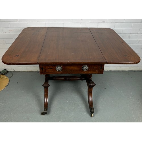 489 - AN EARLY 19TH CENTURY PEMBROKE TABLE WITH EBONY INLAY ON FOUR LEGS AND CASTORS, 

(some damage to ca... 