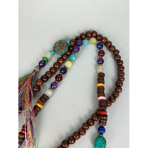 399 - A COLLECTION OF TIBETAN PRAYER BEADS