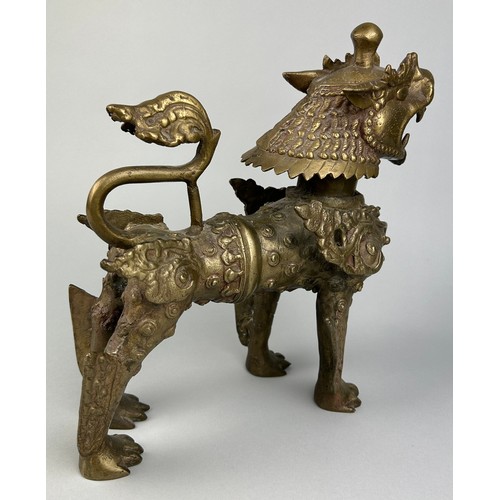 10 - A LARGE 19TH OR 20TH CENTURY BRONZE FIGURE OF A LION,

30cm x 30cm x 10cm