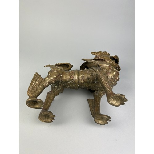 10 - A LARGE 19TH OR 20TH CENTURY BRONZE FIGURE OF A LION,

30cm x 30cm x 10cm