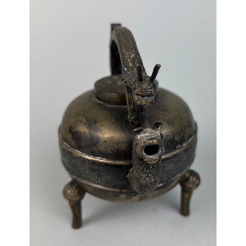 18 - A 20TH CENTURY CHINESE BRASS INCENSE BURNER ON TRIPOD FEET,
 
9cm x 9cm