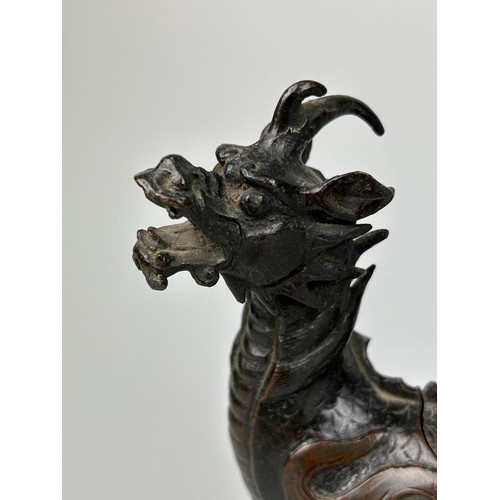 9 - A CHINESE BRONZE FIGURE OF A MYTHICAL ANIMAL, POSSIBLY 18TH CENTURY,

18cm x 14cm 

With opening com... 