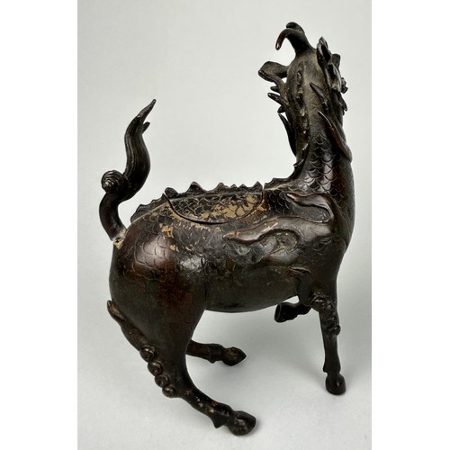 9 - A CHINESE BRONZE FIGURE OF A MYTHICAL ANIMAL, POSSIBLY 18TH CENTURY,

18cm x 14cm 

With opening com... 