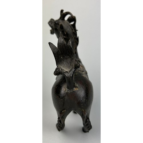 9 - A CHINESE BRONZE FIGURE OF A MYTHICAL ANIMAL, POSSIBLY 18TH CENTURY,

18cm x 14cm 

With opening com... 