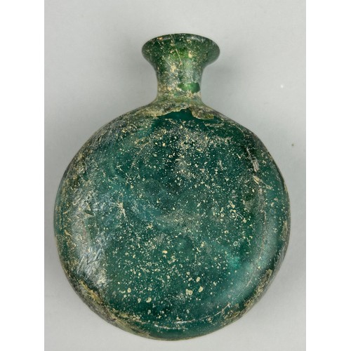 246A - A GREEN LUSTROUS FLASK BOTTLE POSSIBLY ROMAN, 

10cm x 8cm