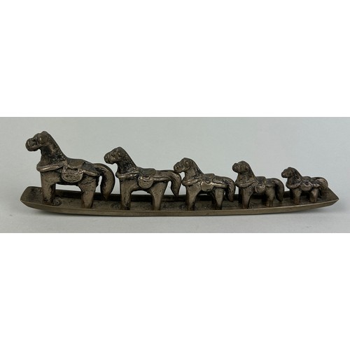 23 - A CHINESE METAL STAND WITH FIVE HORSES OF GRADUATING SIZE, 

Stand 24cm 

Largest horse 6cm x 5.5cm