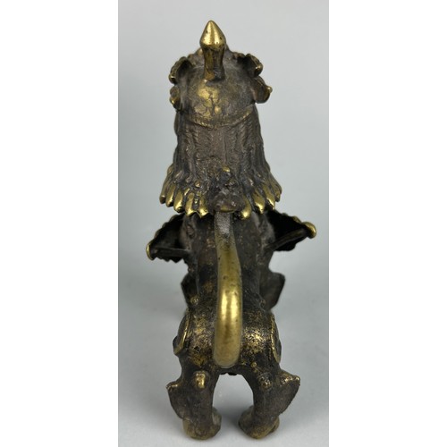 12 - A 19TH CENTURY GILT BRONZE FIGURE OF A LION,

15cm x 13cm