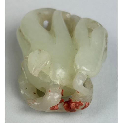 33 - A 19TH CENTURY CHINESE WHITE JADE CARVING OF A BUDDHAS HAND CITRON, 

5cm x 3.8cm 

On later rosewoo... 