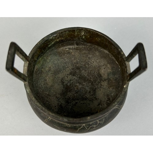 6 - A CHINESE BRONZE CENSER ON TRIPOD FEET WITH SIX CHARACTER MARK TO VERSO, 

9cm x 9cm