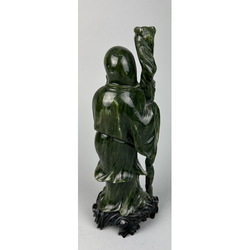 39 - A 20TH CENTURY CHINESE SPINACH JADE FIURE OF SHOULOU,

20cm H