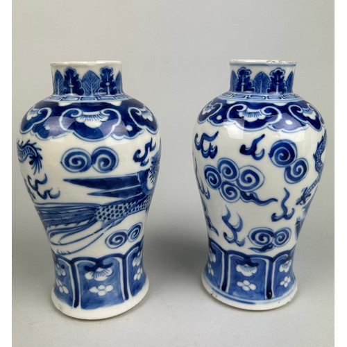 58 - A PAIR OF 19TH CENTURY CHINESE BLUE AND WHITE JARS EACH DECORATED WITH A FOUR CLAWED DRAGON,

15cm x... 