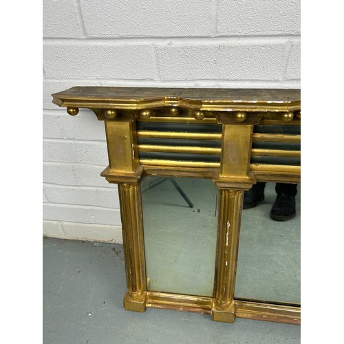 531 - WILLIAM IV GILT COMPOSITION TRIPLE PLATE OVERMANTEL MIRROR CIRCA 1830, 

The cavetto cornice applied... 