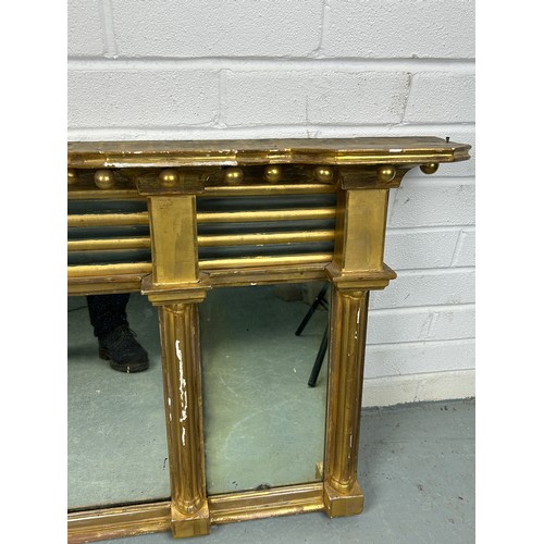 531 - WILLIAM IV GILT COMPOSITION TRIPLE PLATE OVERMANTEL MIRROR CIRCA 1830, 

The cavetto cornice applied... 