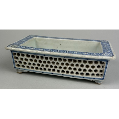 67 - A 20TH CENTURY BLUE AND WHITE PAINTED PORCELAIN JARDINIERE WITH RETICULATED SIDES,

17cm x 11cm x 5c... 