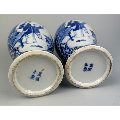 55 - A PAIR OF 19TH CENTURY CHINESE BLUE AND WHITE PORCEALIN VASES WITH LIDS,

Decorated with figures and... 