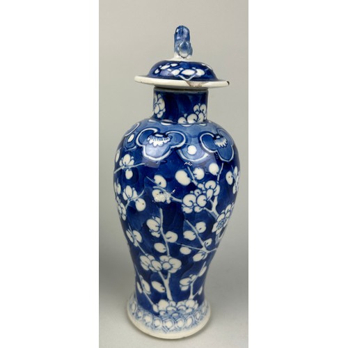 57 - AN EARLY 19TH CENTURY CHINESE BLUE AND WHITE PORCELAIN VASE DECORATED WITH PRUNUS FLOWERS,

22cm H