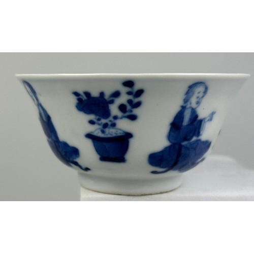 60 - A CHINESE KANGXI PERIOD BOWL DECORATED WITH FIGURES, DOGS AND FLOWERS,

8cm x 8cm x 4.2cm